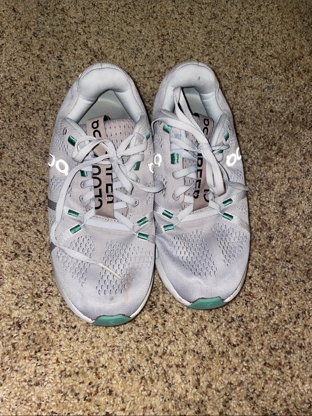 On Running Cloud Shoes in White with Mint Accents